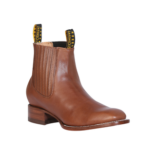 Brown leather boot with a brand label