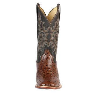 Brown cowboy boot with intricate stitching