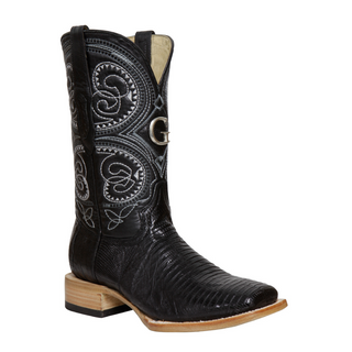 Black cowboy boot with intricate embossing