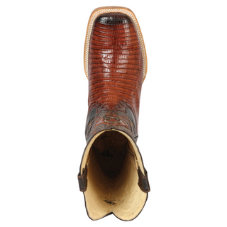 Brown cowboy boot with detailed pattern