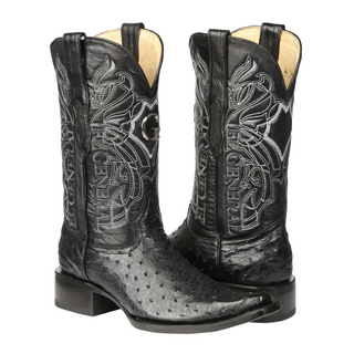 Pair of black ostrich cowboy boots with intricate white embroidery