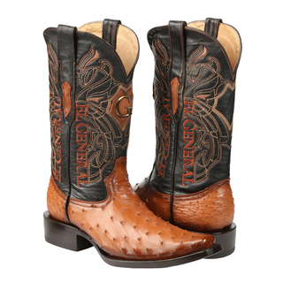 Pair of brown cowboy boots with intricate designs