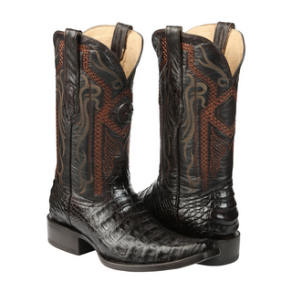Pair of brown cowboy boots with intricate design on a white background