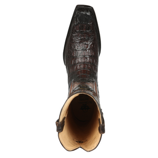 Close-up of a brown cowboy boot with a detailed pattern