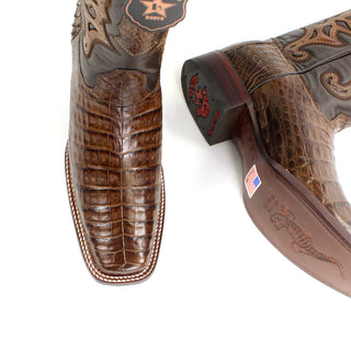 Pair of Genuine caiman belly leather with a smooth cowhide upper, these boots feature a bold square toe and traditional hand-stitched detailing