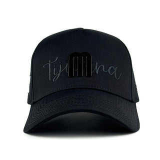 Black Tijuana M Hat by Forty Five featuring raised M logo and embroidered Tijuana text.