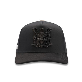 Front view of AMR Placa Black Snapback featuring bold metallic AMR plaque