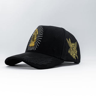 Black La Guadalupana Snapback with gold Our Lady of Guadalupe embroidery and Saint Michael graphic.