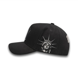 Left side view showing Statue of Liberty embroidery on NY Black/Gray Snapback Hat