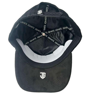 Black cap with white text and logo on a light gray background