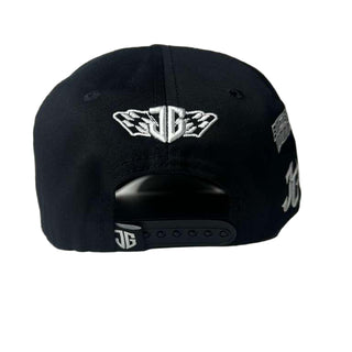 Black cap with white logo on a white background