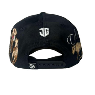 Black cap with animal designs and branding on a light gray background