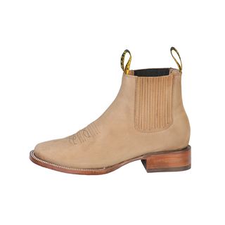 Beige Chelsea boot with brown sole