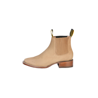 Beige Chelsea boot with brown sole