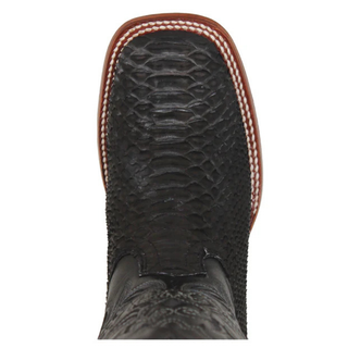 Close-up of genuine python skin texture on women’s cowboy boots