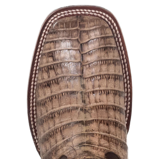 Close-up of wide square toe mocha caiman belly leather pattern on women’s cowboy boot