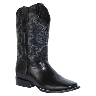Black cowboy boot with intricate white embroidery 