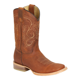 Brown cowboy boot with intricate stitching 