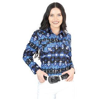 Woman wearing a Blue El General long-sleeve Western shirt with Aztec pattern.