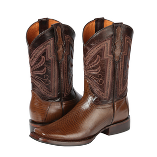 Pair of brown cowboy boots with intricate designs 