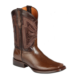 Brown cowboy boot with intricate leatherwork 