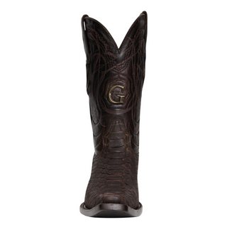 Brown cowboy boot with decorative patterns and a gold logo 