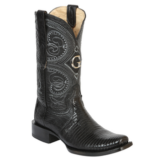 Black cowboy boot with intricate embossing 