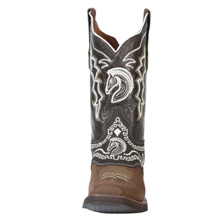 Brown and black cowboy boot with intricate white embroidery 