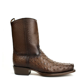 Sleek semi square toe, premium leather shaft with detailed pattern embossing, and an exotic ostrich leg vamp