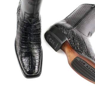 Pair of Genuine caiman belly leather with a smooth cowhide upper, these boots feature a bold semi square toe and traditional hand-stitched detailing