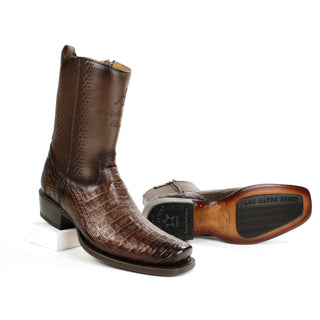 Genuine caiman belly leather with a smooth cowhide upper, these boots feature a bold semi square toe and traditional hand-stitched detailing