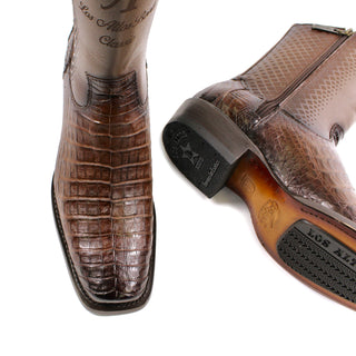 Pair of Genuine caiman belly leather with a smooth cowhide upper, these boots feature a bold semi square toe and traditional hand-stitched detailing