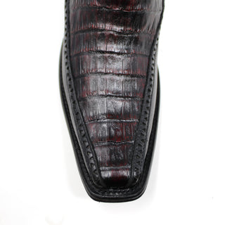 Close-up of black cherry caiman belly leather on European toe cowboy boot