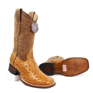 Pair of Los Altos Amber full quill ostrich cowboy boots with square toe for men with sole view 
