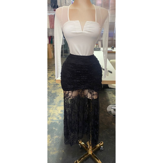 Black high-waisted ruched lace skirt with sheer floral detailing and a long mesh overlay