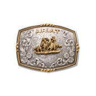 Decorative belt buckle with intricate designs and 'ARIAT' branding on a white background