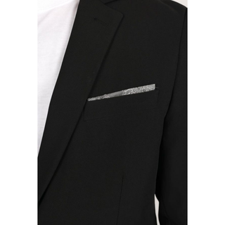 Black suit jacket with a silver pocket square Men's black modern-fit blazer with gray pocket square styled over white t-shirt and dark jeans