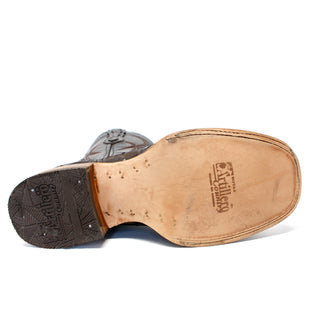 Bottom view of Artillero men’s cowboy boot with leather sole and Artillero logo branding