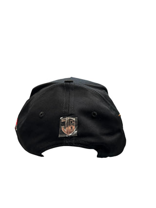 Back view of black JG Double Gallo snapback hat with metallic rear logo emblem