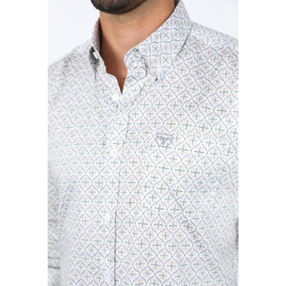 Man wearing a light gray with green accents long sleeve geometric print button-down shirt paired with jeans, modern men's fashion look0- front view- close up of collar and button view 