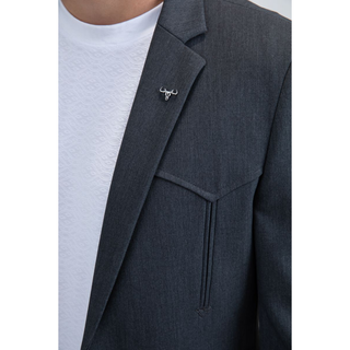 Close-up of bull skull lapel pin and Western yoke detailing on blazer