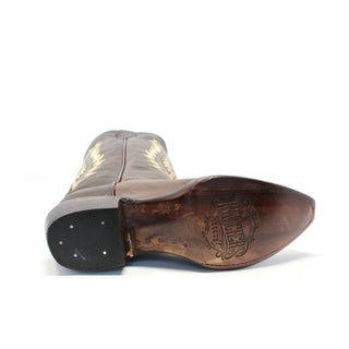 Close-up of leather sole on Rancher's women’s Brown leather cowboy boot with logo embossed