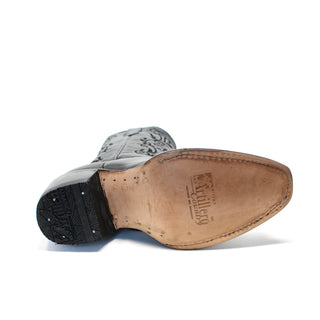 Close-up of leather sole on Artillero women’s black leather cowboy boot with logo embossed