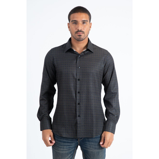 Man wearing a black and multi color long sleeve geometric print button-down shirt paired with jeans, modern men's fashion look- front view 
