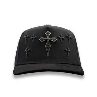 Front view of Cruz Black/Silver Snapback Hat featuring large silver cross emblem