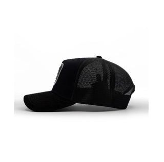 Side profile of The King Ranch black mesh trucker hat with breathable backing