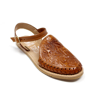 Women's handmade genuine leather artisan huarache sandals featuring a woven leather upper, adjustable ankle buckle strap, cushioned leather footbed, and durable rubber outsole, handcrafted in Mexico for everyday comfort and style.