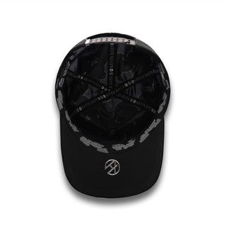 LA NUVES Black Cap – inside view showing custom logo taping and brim embroidery