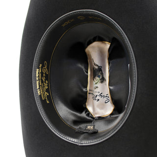 Close-up of inner lining with Larry Mahan signature and craftsmanship details.