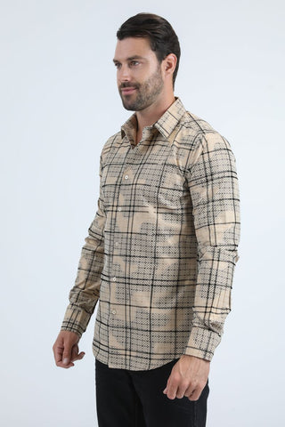 Man wearing a beige long sleeve geometric print button-down shirt paired with jeans, modern men's fashion look- side view 